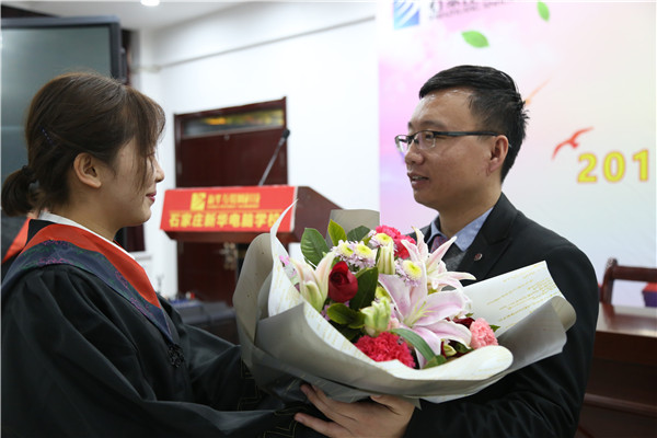 ʯ���f���A��X�WУ