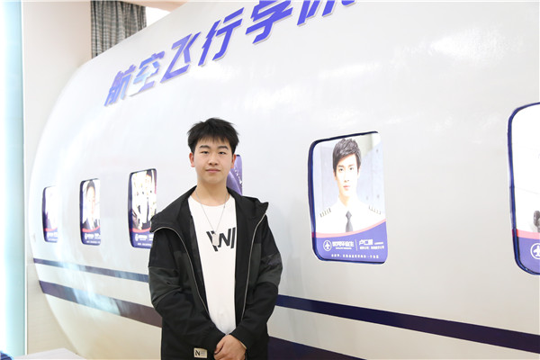 ʯ���f���A��X�WУ