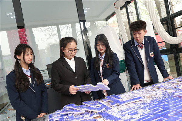 ʯ���f���A��X�W(xu��)У