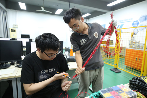 ʯ���f���A��X�W(xu��)У